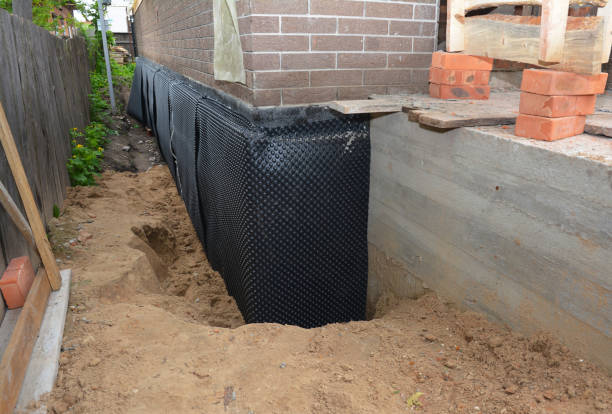 SJ Waterproofing Pros technician performing targeted Emergency Waterproofing assessment in Richwood, OH